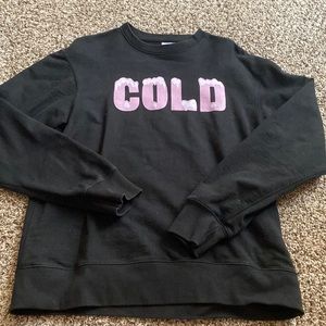 Black Sweatshirt that has Cold written on the front